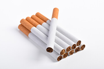 Pile of cigarettes with filters isolated on white background