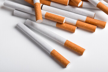 Cigarettes with filter isolated on white background. Bad habits. Smoking leads to lung cancer