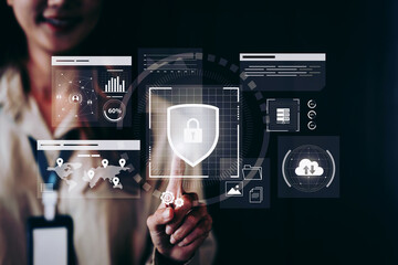 Business woman pointing digital cybersecurity interface cyber security network and data protection shield on internet with a digital padlock and many folder. encrypted connection password protect