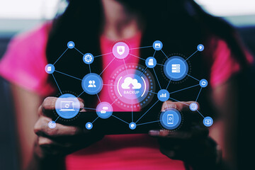 Business woman using smartphone for Database Cloud Computer backup technology and data security storage online for computer business ideas and prevent for cyber crime. Networking and internet service