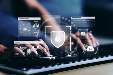 Businesswoman using laptop. digital cybersecurity interface cyber security network and data protection shield on internet with a digital padlock and many folder. encrypted connection password protect