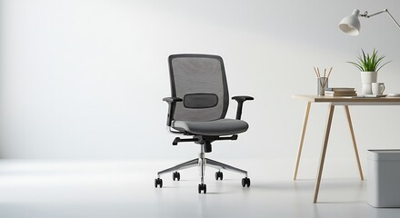 Ergonomic office chair with mesh back and adjustable armrests, positioned next to a desk with a lamp and plant against a bright, neutral background.