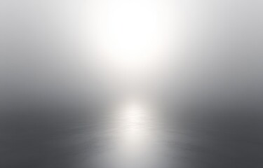 foggy landscape with soft sunlight reflected on calm water creating a serene and tranquil atmosphere
