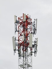 Telecommunication tower of 4G and 5G cellular. Base Station or Base Transceiver Station. Wireless Communication Antenna Transmitter. Telecommunication tower with antennas isolated on white background