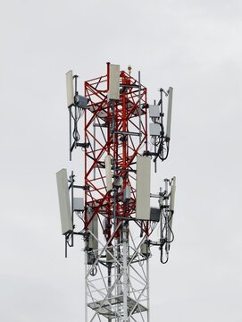 Telecommunication tower of 4G and 5G cellular. Base Station or Base Transceiver Station. Wireless Communication Antenna Transmitter. Telecommunication tower with antennas isolated on white background