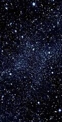Dazzling night sky. A vertical cosmic view showcasing countless twinkling stars against a vast, dark blue expanse, creating an ethereal, infinite feeling