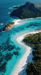 An aerial view of a pristine beach, turquoise waters flowing between white sand and lush green forested island, creating a stunning coastal landscape
