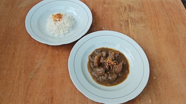 spa still life,Semur daging is an Indonesian meat stew in thick brown gravy,served with steamed rice