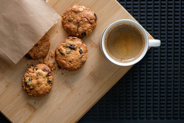 Espresso Coffee with Homemade Cookies on Wooden Board