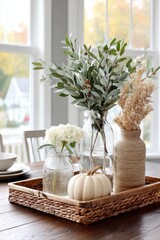 Rustic autumn table decor with white pumpkin and dried floral arrangement. DIY Fall Centerpieces. warm cozy atmosphere for Thanksgiving or fall