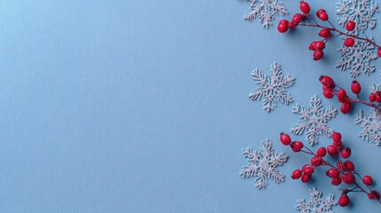 Festive Red Berry Branch with Snowflake Decorations on Light Blue Background