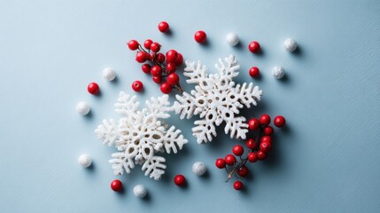 Festive White Snowflakes and Red Berries Holiday Decoration on Light Blue Background