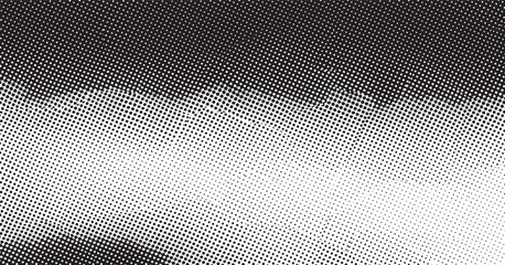 Halftone dot pattern on a black and white metal grid background