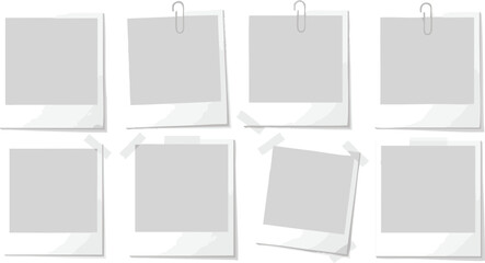 Eight blank instant photo frames, various angles, paper clips and tape.