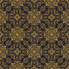 Ornate gold pattern on dark blue background creates a luxurious wallpaper, patern seamless, Stock royalty free.