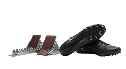 SPORT - Close-up of black track spikes and starting blocks isolated on white background, perfect for athletic competitions and sports training