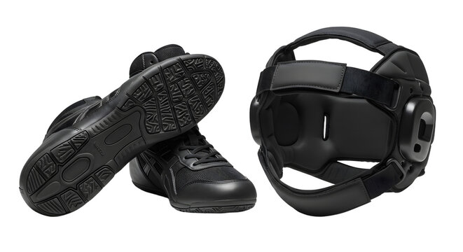 SPORT - Black wrestling shoes and protective headgear isolated on white, perfect for wrestling training and sports competitions
