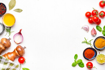 Food background, tomatoes, spices and herbs, ingredients for healthy eating and cooking, copy space, top view