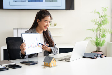 Asia business woman professional real estate sale agent talking explaining business contracts,...