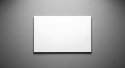 Blank White Book on Gray Wall.