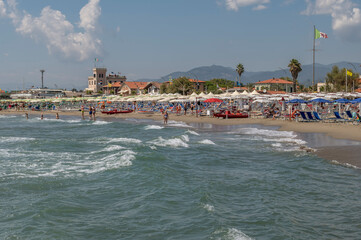 A summer day on the beach in Marina di Massa, Italy