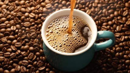 Coffee pouring into a blue cup surrounded by roasted coffee beans galore view