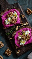 Beetroot and Goat Cheese Toast with Walnuts on Wooden Board.