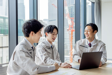 Obraz premium 作業服のスタッフ