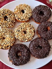 Delicious donuts with various toppings on top, a delicious snack choice that is easy to make