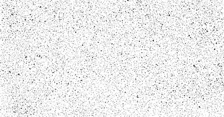 Dense fine grained monochrome dotted noise texture on white minimal abstract design