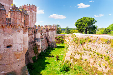 Castle of coca showing defensive moat and walls on sunny day © Iván Moreno