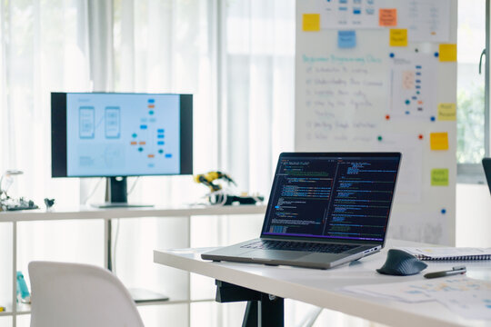 Programmer coding developer technology office software ux ui computer workspace - Powered by Adobe