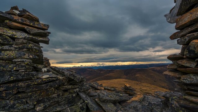 Rocky foreground framing a distant mountain range