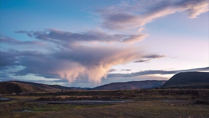 Unusual cloud formation over a rural valley