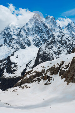 Mountaineers climbing the Glacier Blanc in the Alps