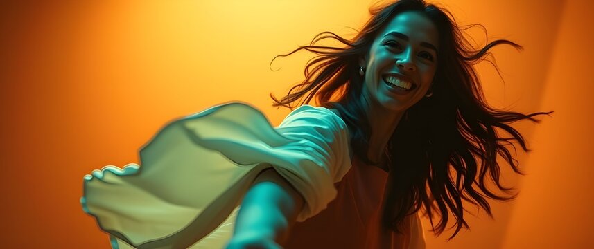High-angle perspective, surreal infrared tones, professional photography depicting a woman with joyful expression, flowing hair and clothing, dancing gracefully against a warm.