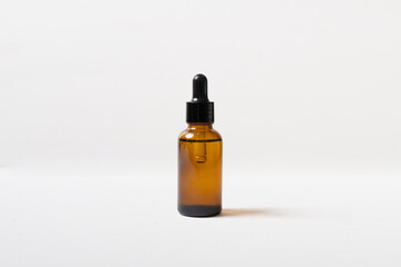 cosmetic glass bottle isolated on white background, cosmetic or serum mockup.