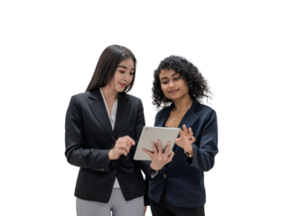 Two Professional Women Collaborating on Digital Tablet in Office