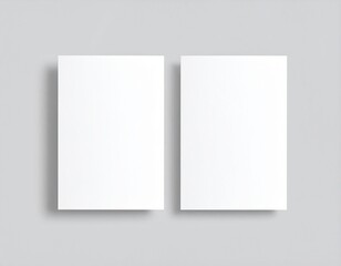 Blank folded paper mockup on gray background. Top view of empty white sheet template for flyer, brochure, invitation, or leaflet design. Minimal stationery concept with clean surface and soft shadows.