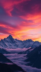 Dramatic mountain range under a fiery sunset sky peak