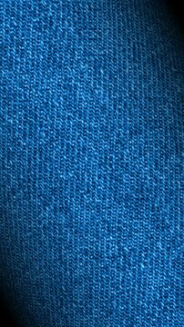 Smooth rotation of blue jeans fabric with detailed fine finish, presenting a tactile elegant display in exclusive premium luxurious design style
