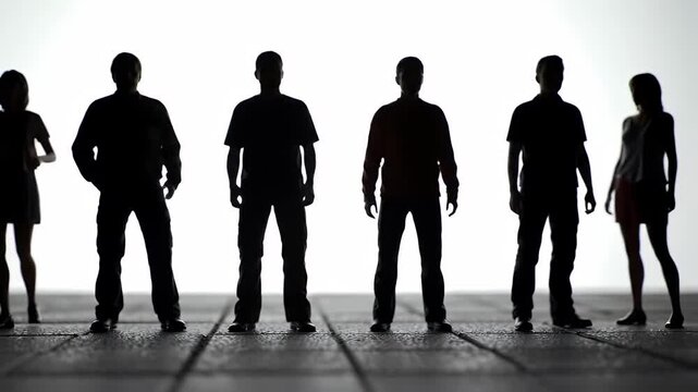 Silhouetted Group of Men and Women Standing on Tiled Surface in Bright White Light