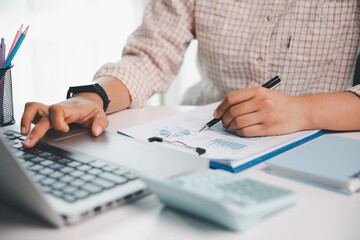 Businesswoman analysis with financial data, marketing business strategy project, Business financing accounting banking concept, finances, calculate about cost to real estate investment, tax system.