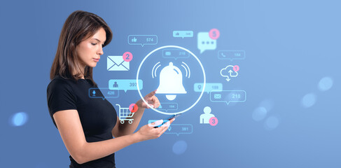 Woman using smartphone with digital notification icons on blue b
