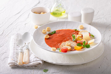 Exclusive tomato soup in exclusive restaurant made by the chef.