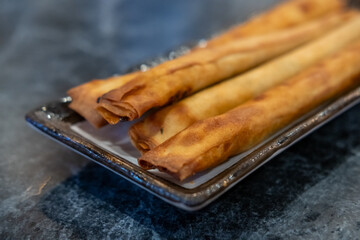 Fried wontons served on plate