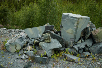 A breathtaking rock formation surrounded by vibrant greenery, enhancing the scenic beauty