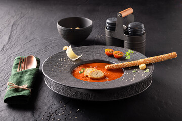 Exquisite tomato soup as premium food made in restaurant.