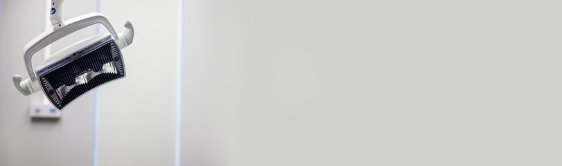 Dental chair apparatus ready for patient examination in modern clinic