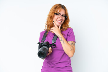 Fototapeta premium Young photographer caucasian woman isolated on white background happy and smiling